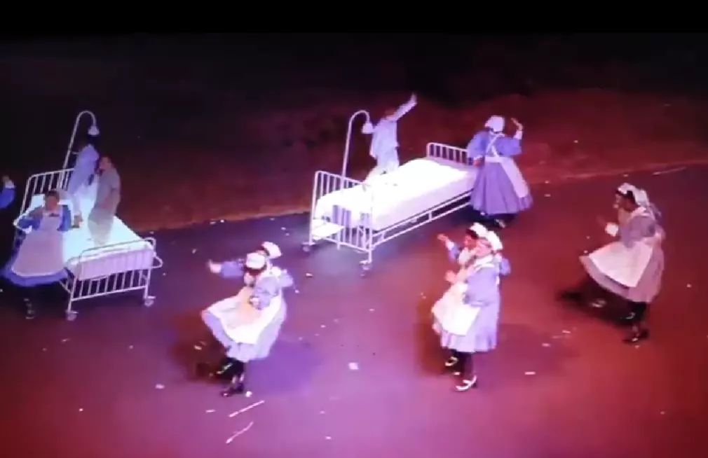 2012 London Olympics shows dancing nurses and children in hospital beds predicting covid pandemic